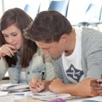 Students revising at desk
